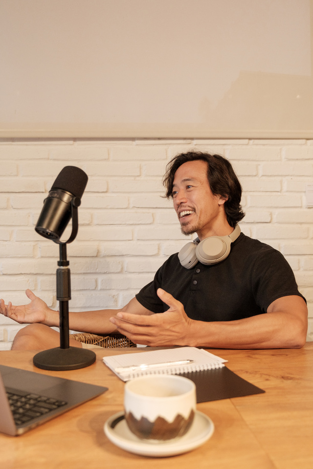 Portrait of a Happy Male Podcaster